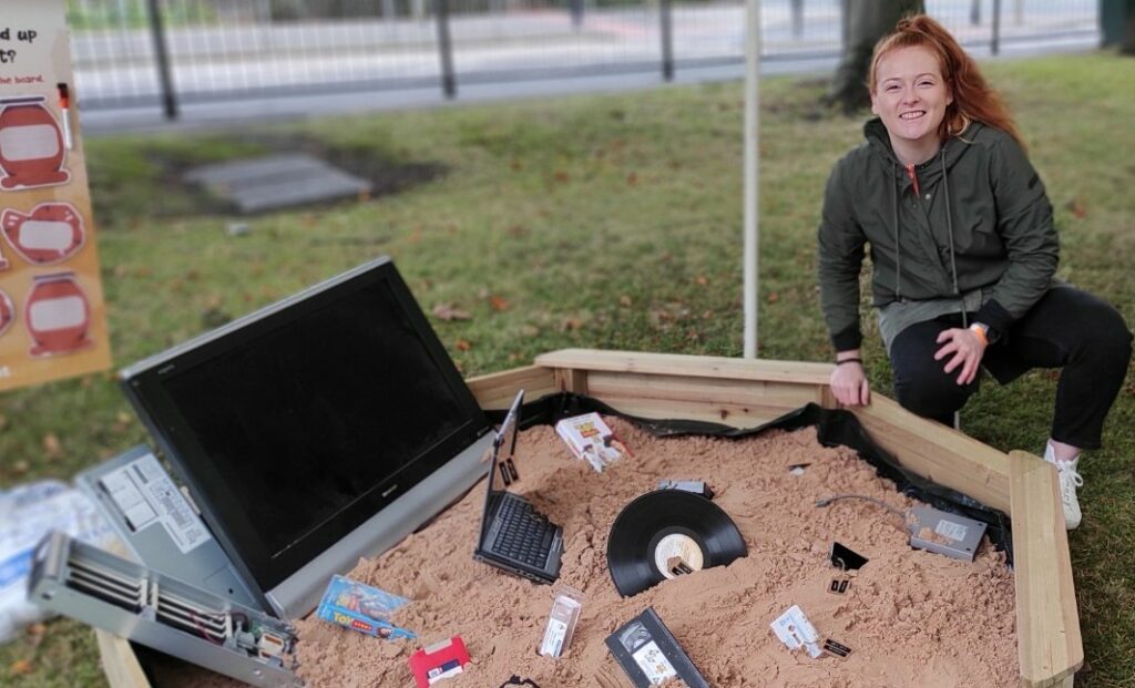 Tiffany Mazza of Ortial with a display highlighting the waste involved in obsolete technology