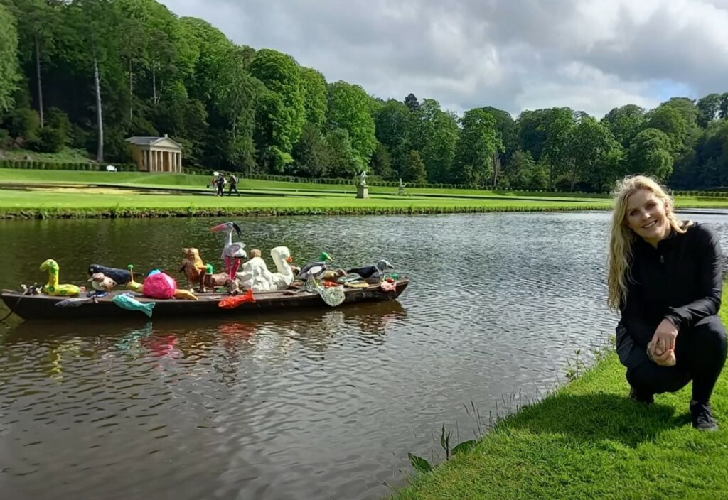 Artist Catt van Leijen at Fountains Abbey beside one of the Waterlogged project's displays