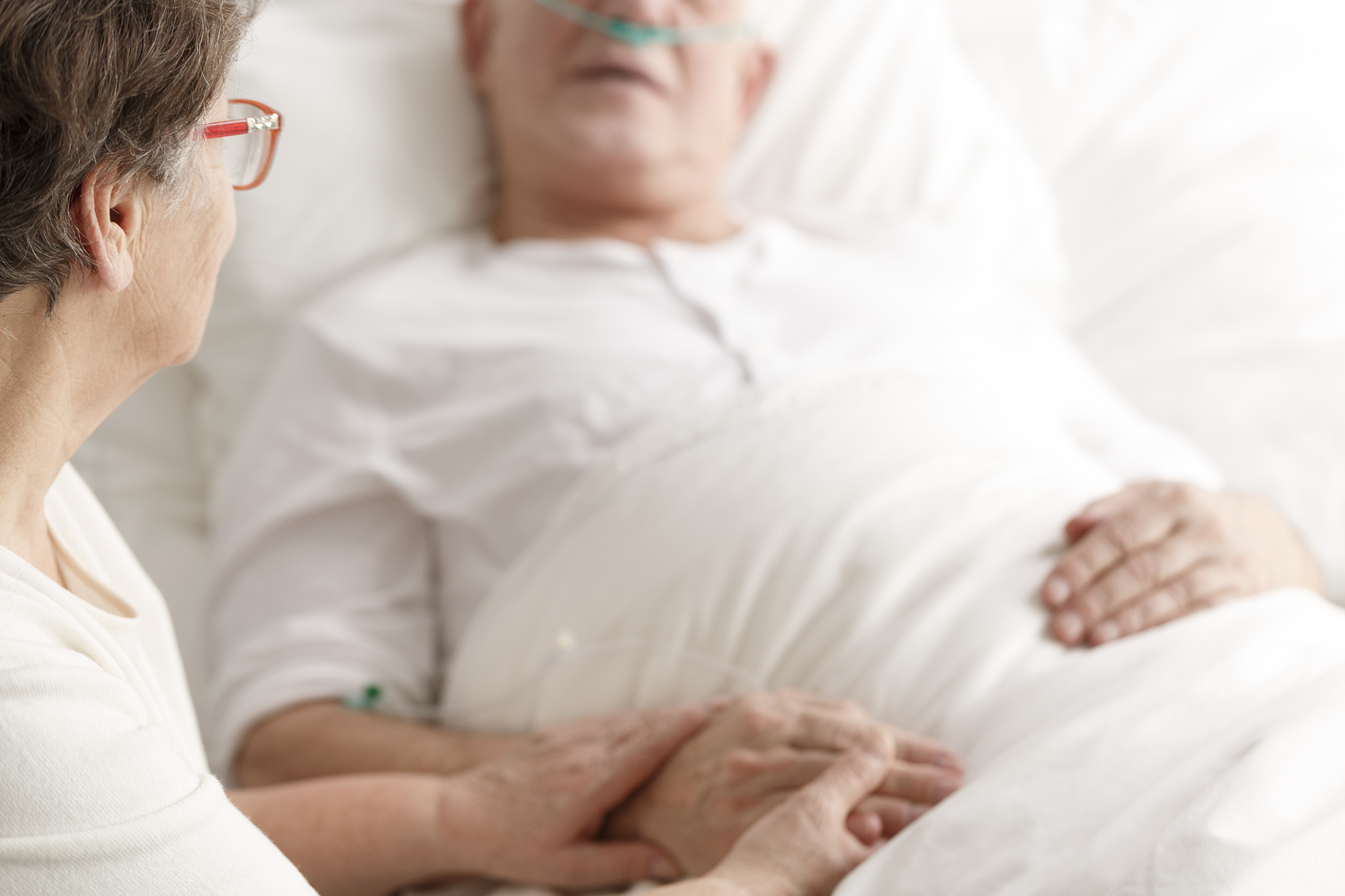 Loving wife caring about dying ill spouse before his death