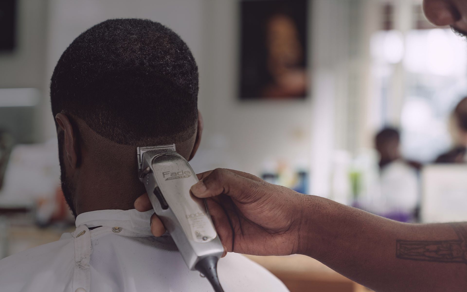 Male getting a fade haircut