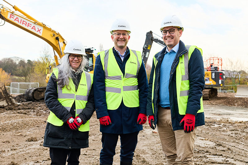 MP Tom Gordon stood with Harrogate College Principal Danny Wild on the building site