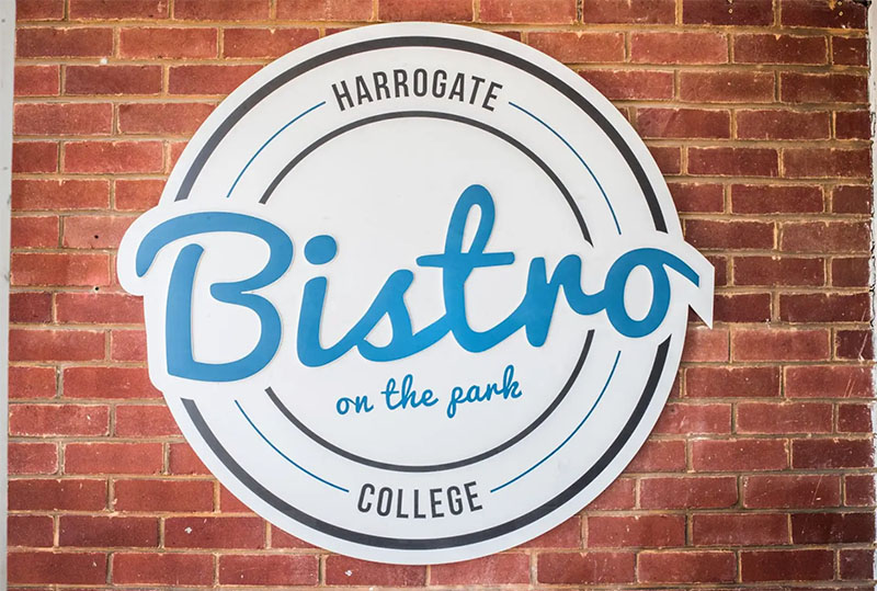 Harrogate College Bistro on the park wall sign
