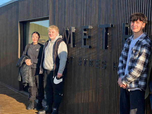Students stood outside the entrance of Sykes Farm building