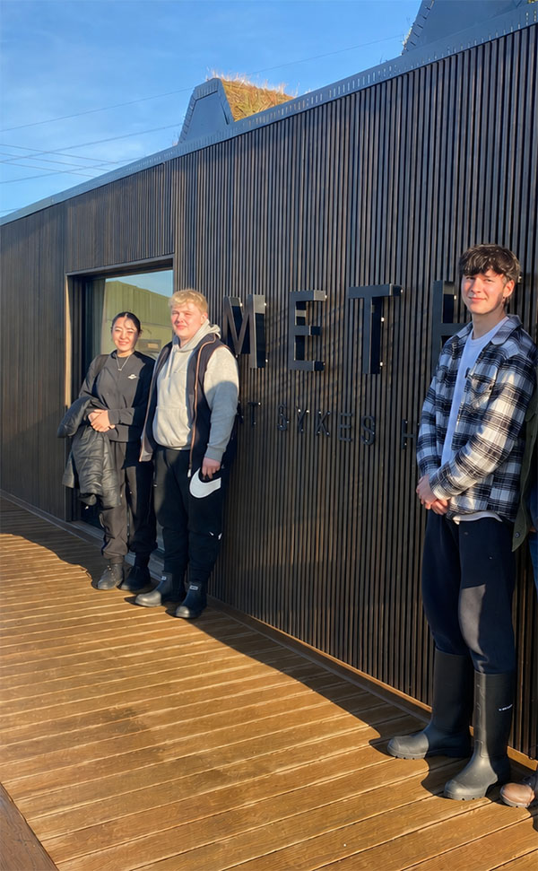 Students stood outside Sykes Farm building