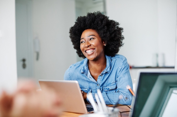Business woman in a modern office or a student in a classroom