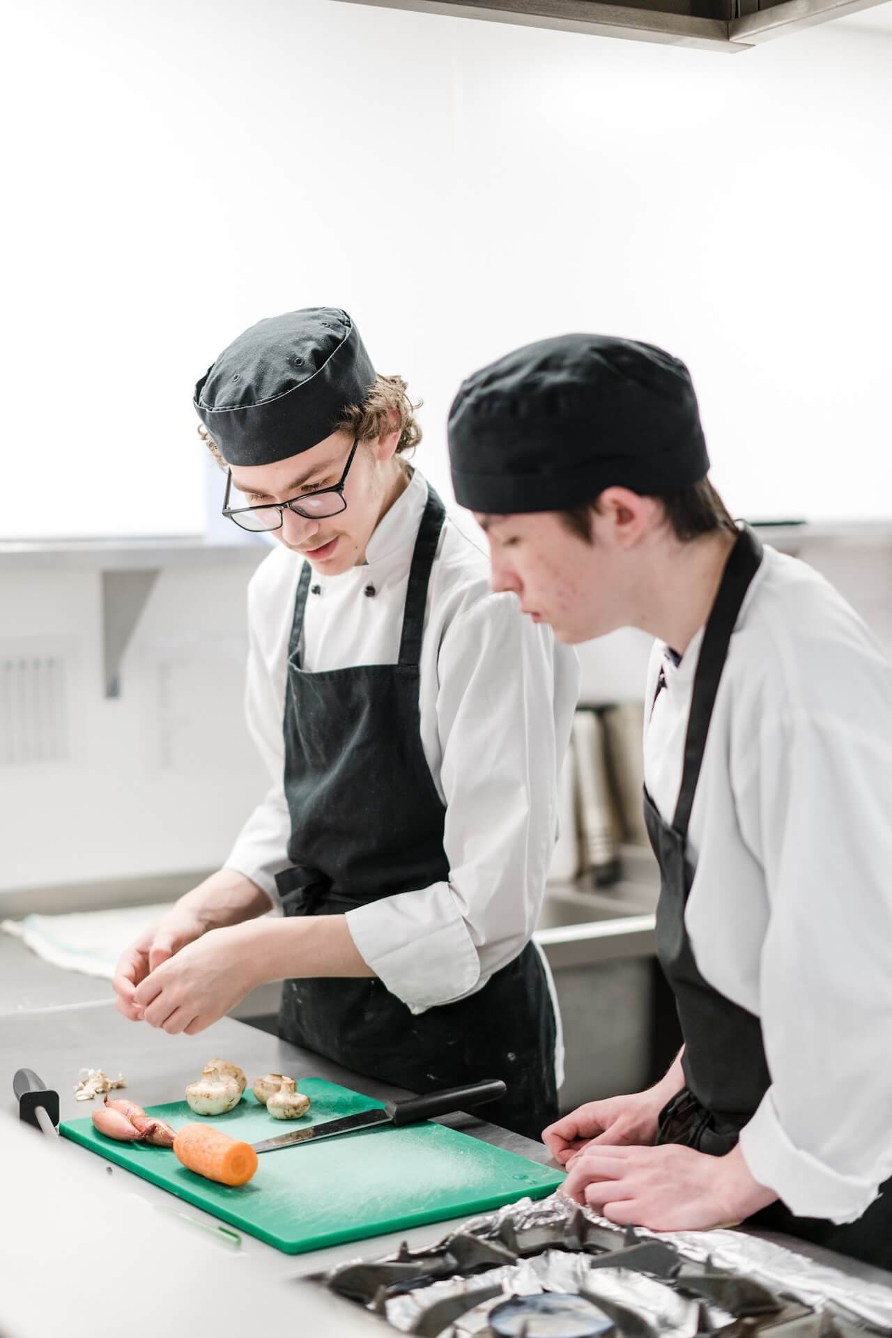 Two student chefs working