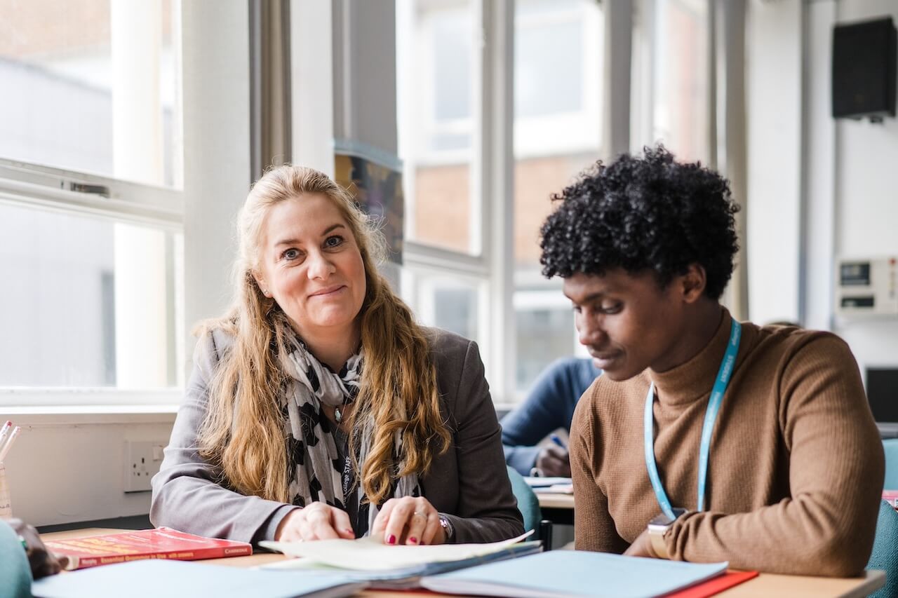 Tutor working with a student