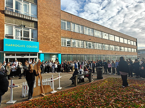 Students and staff stood outside Harrogate College paying respects on Remembrance Day